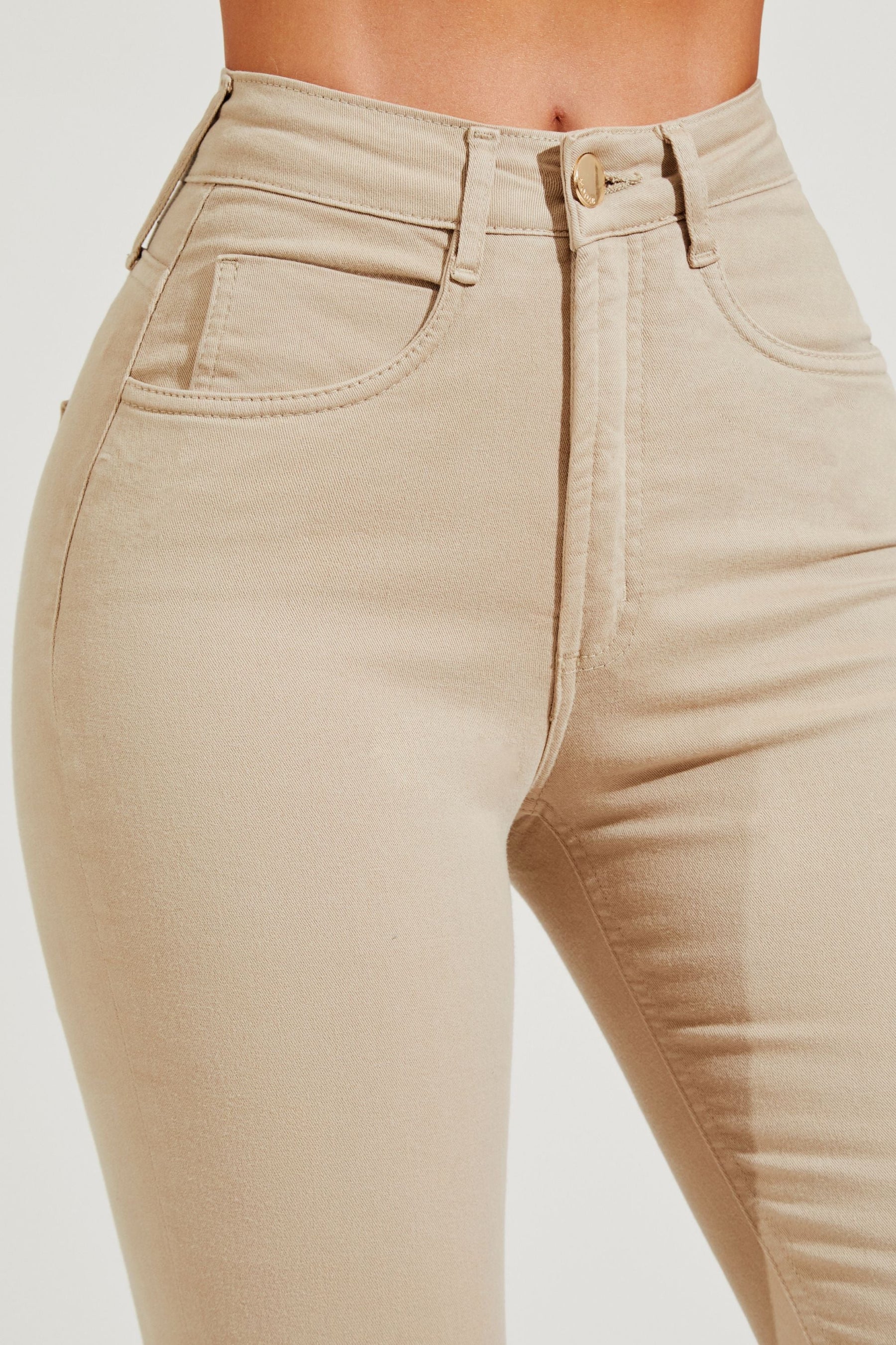 Calça Jeans Modeladora Nude Boot Cut Cós Médio