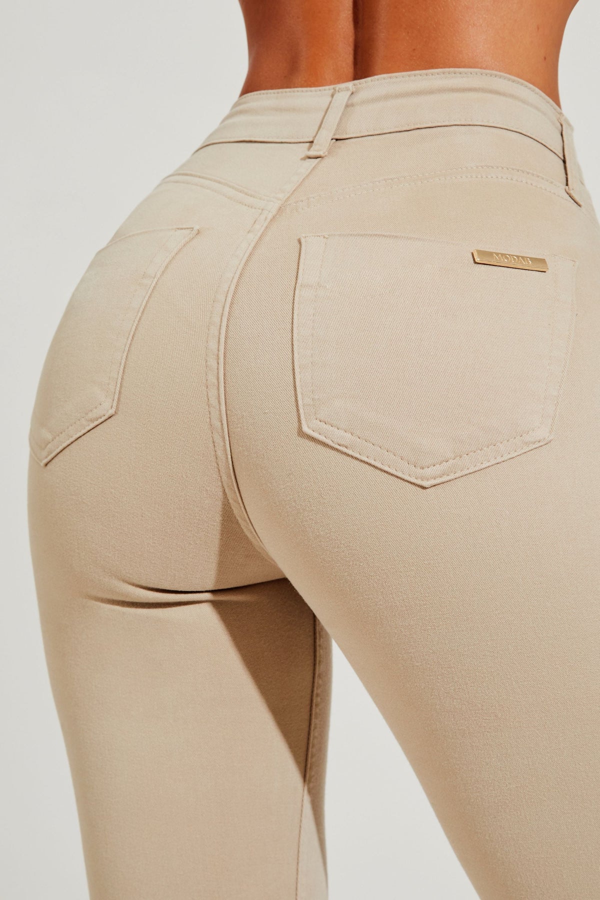 Calça Jeans Modeladora Nude Boot Cut Cós Médio